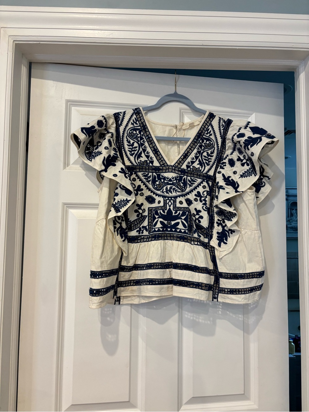 Anthropologie White Blouse with Navy Blue Embroidered Ruffles